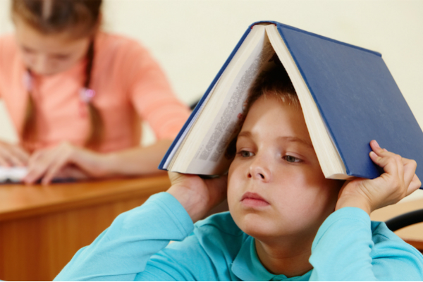 bored-child-reading_600x400