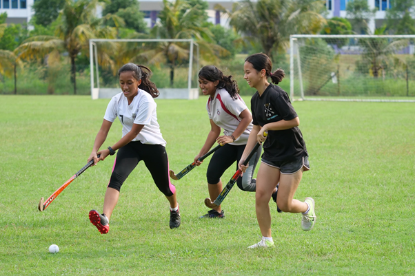 Students Playing Hockey